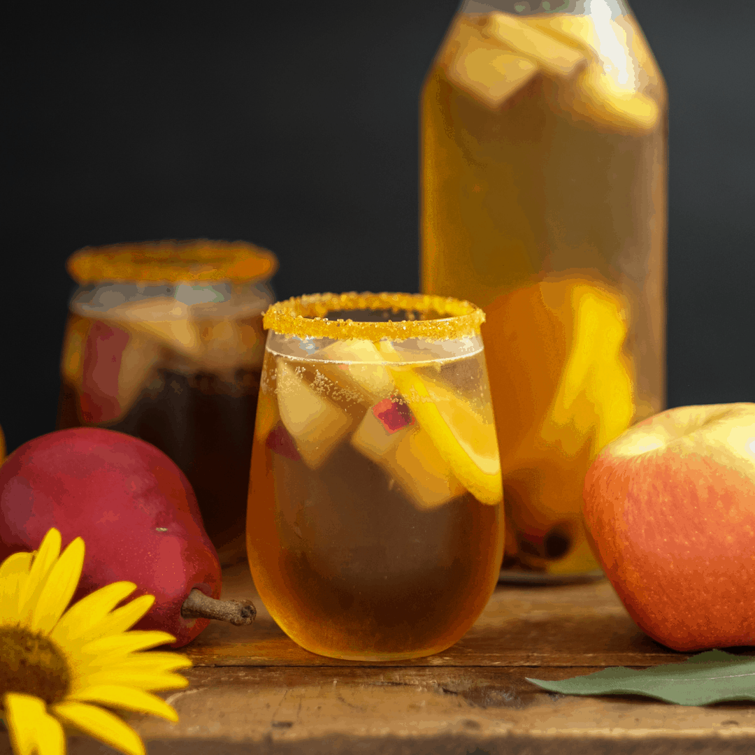 Autumn Apple Sangria is a delicious fall season drink. As the weather turns cool and crisp – and nearby orchards are teeming with juicy apples and pears, ready to pick – we love being able to invite friends over to hang out and relax with a glass or mug of this apple sangria in front of the fire.