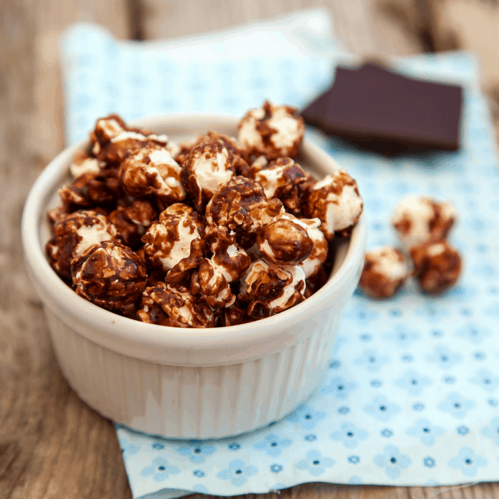 Our Chocolate Caramel Poporn recipe doesn’t use corn syrup - yum! Plus, this chocolate caramel popcorn recipe is easy to make. (Bonus.) This movie night popcorn tastes amazing: buttery and rich and chocolate-y, just the way we love it. And did we mention no corn syrup?